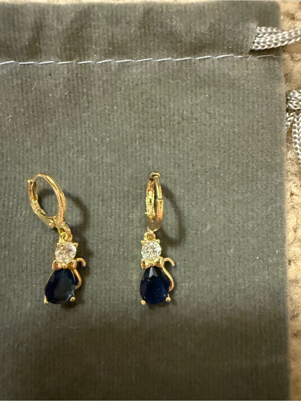 Gold Tone Cat Drop Earrings with Dark Blue Stone